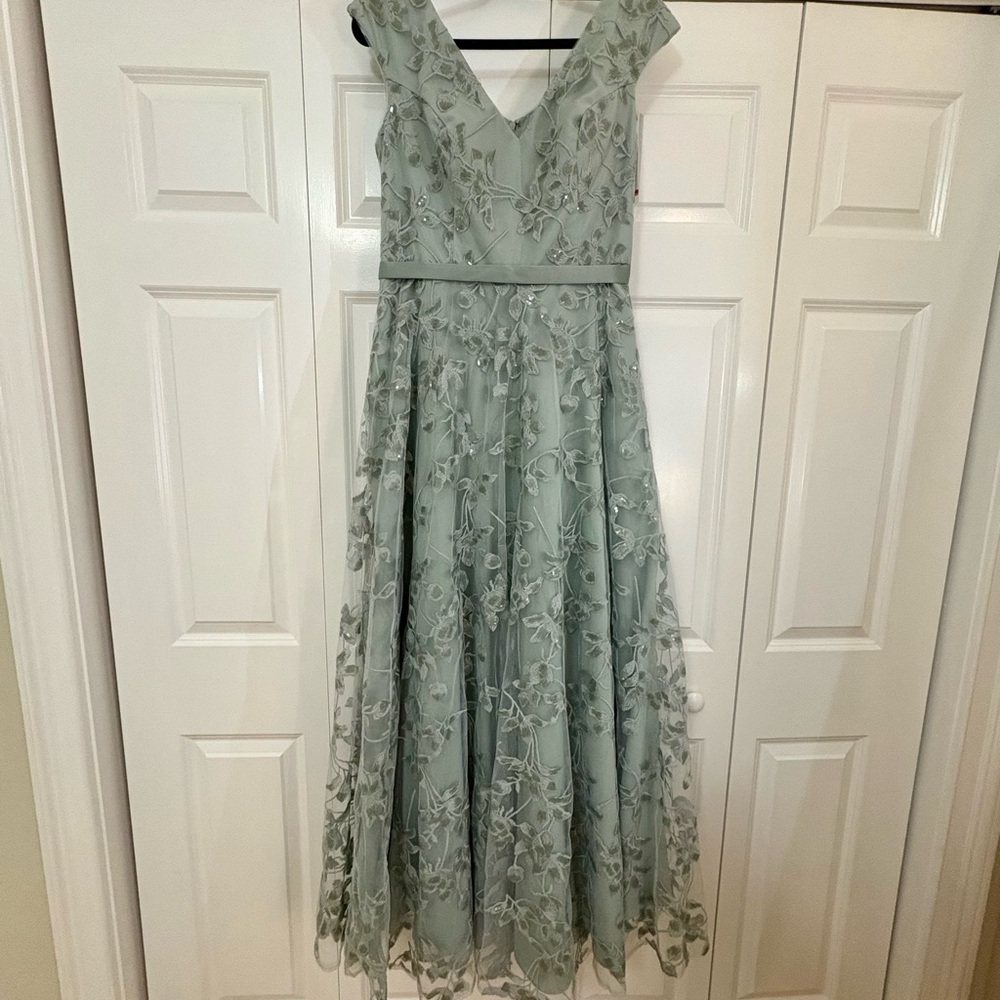 Beautiful dusty sage mother of the bride dress.